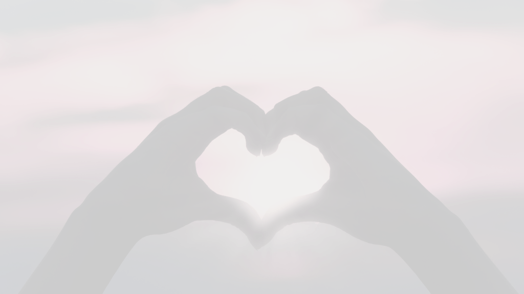 Silhouette of two hands forming a heart shape with soft light glowing through the center.
